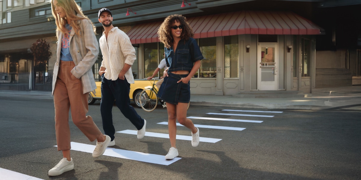 people walking in time off sneakers