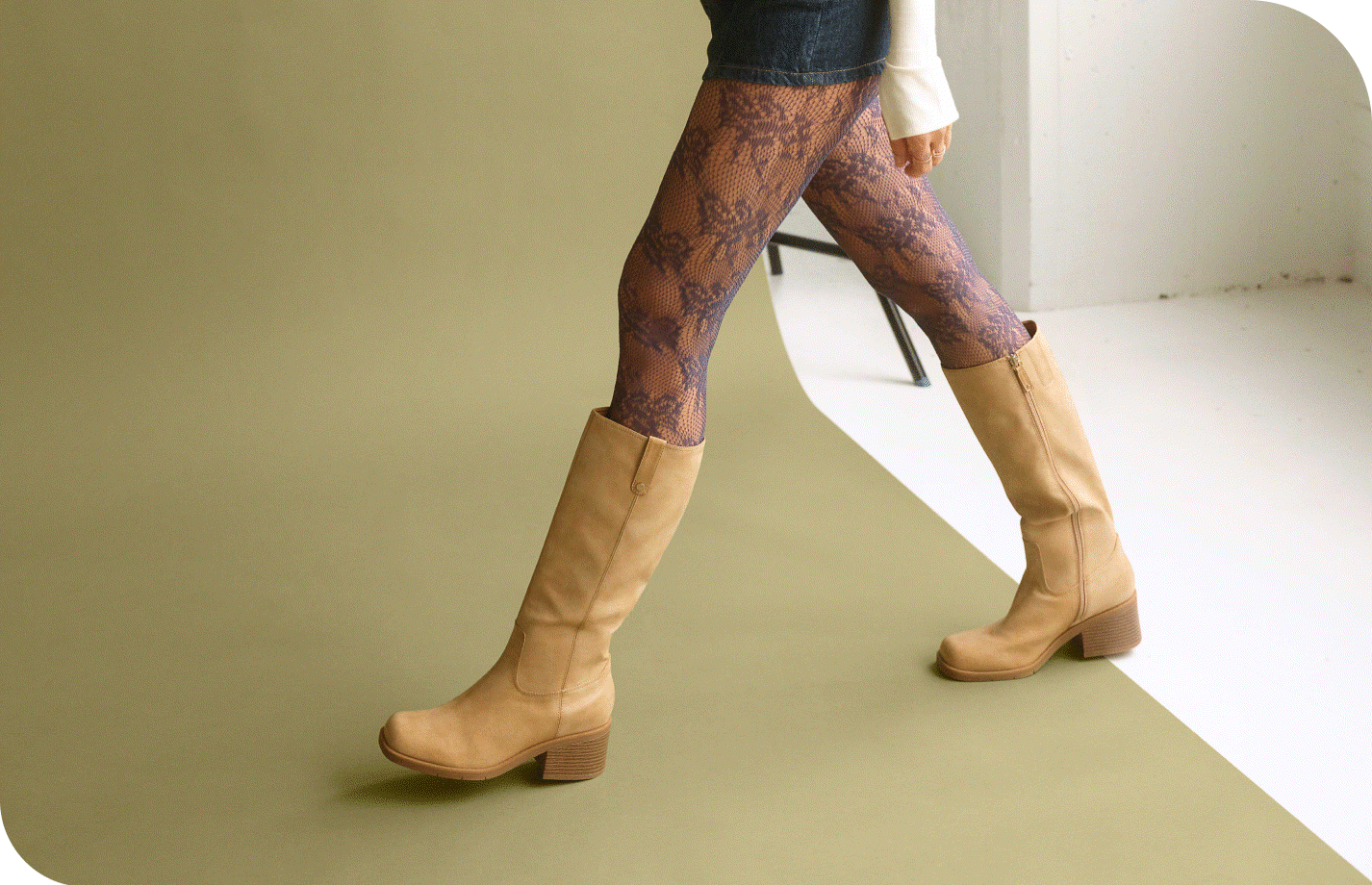 woman walking wearing the joplin boot in tan
