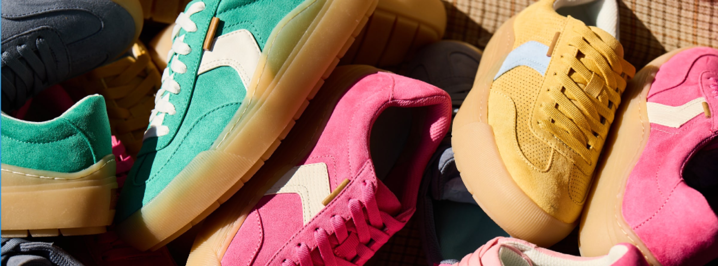 the madison lace sneaker in various colors like pink and yellow