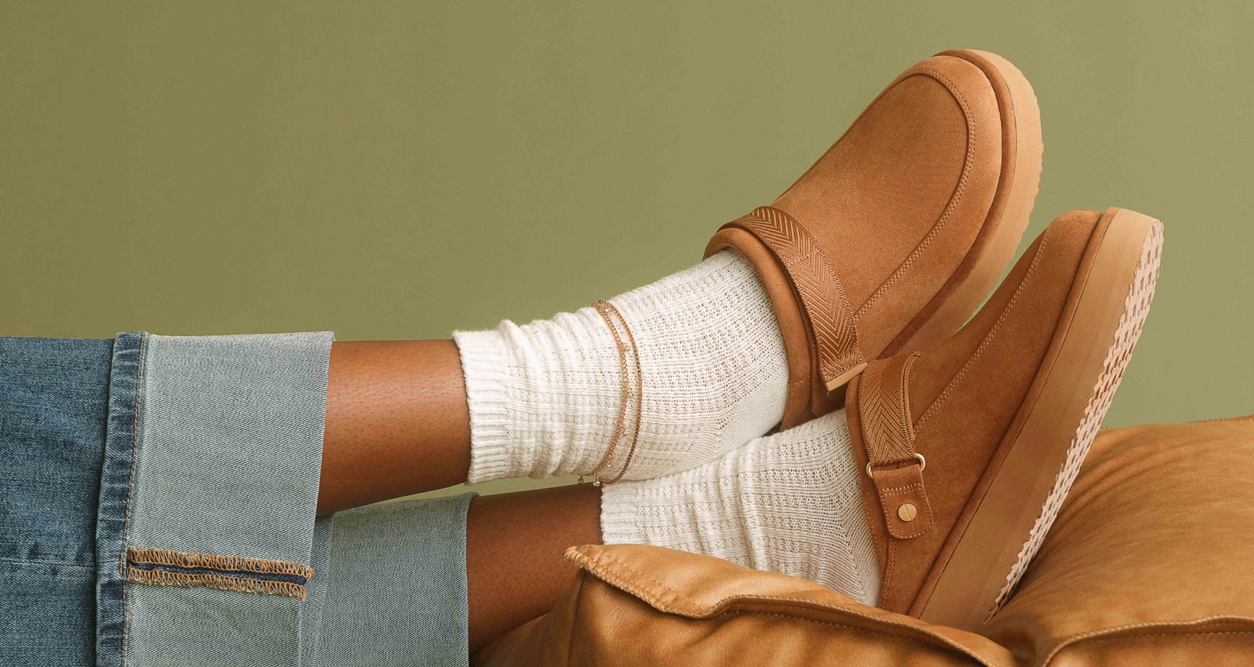 woman wearing the chill time slip on clog with white socks and jeans