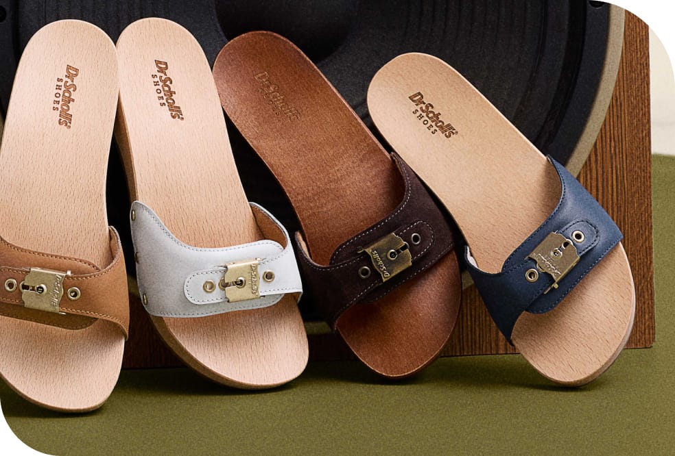 a grouping of the original pescura sandal in white, camel, brown, and navy