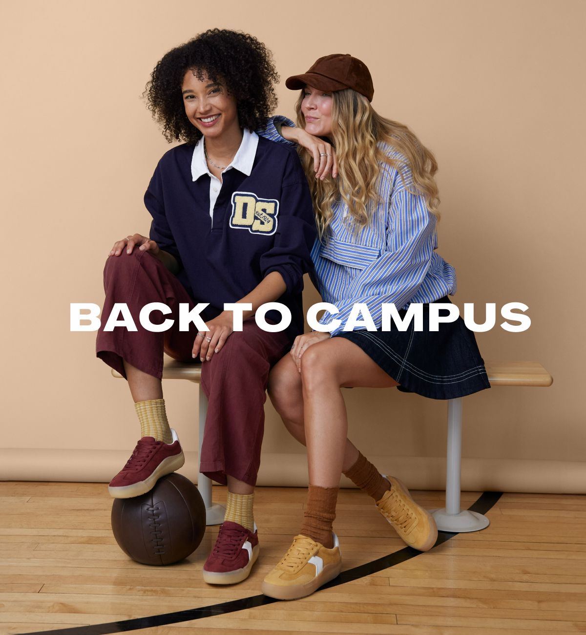 back to campus. two women sitting side by side wearing dr. scholl's sneakers